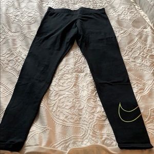 Black Nike leggings with rainbow detail